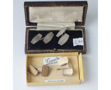 Two pairs of boxed silver cuff links     