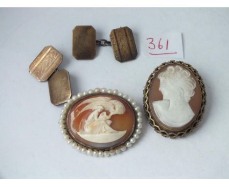 Two carved cameo brooches and a pair of silver cufflinks   