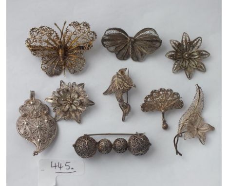 Various silver filigree brooches in form of butterflies, birds etc  