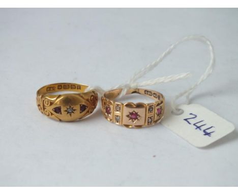 An 18ct diamond and ruby gypsy set ring 1905 and another set in 15ct gold, 4.8g       