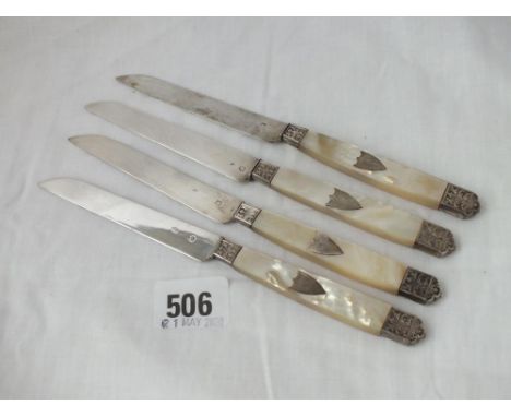 A set of four French silver bladed knives with MOP handles  