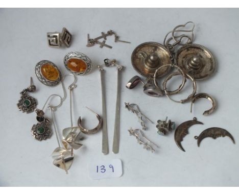 Fourteen pairs of silver earrings, some stone inset   