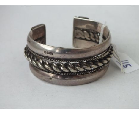 An Egyptian silver bangle, 95g      