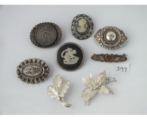 Eight various silver brooches       