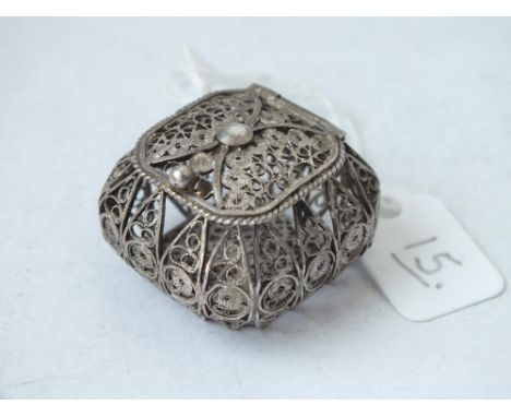 A small silver filigree box with hinged cover    