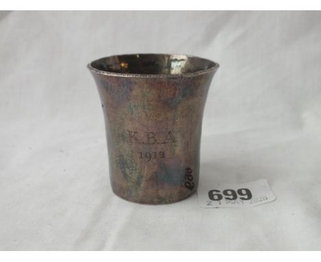 A hammered silver tot unmarked, 2” high    