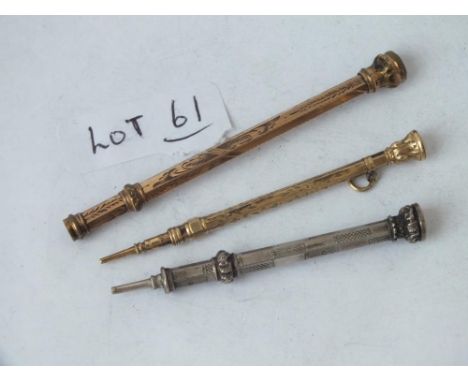 Two gold mounted and propelling pencils and a silver example with inset ends        
