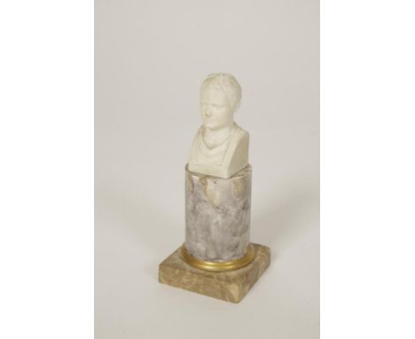 A PARIANWARE BUST OF NAPOLEON mounted on a ceramic column simulating marble, with a marble plinth, 19th century, 7.5" high