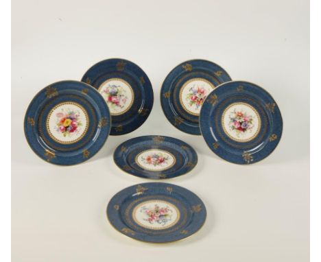 A SET OF SIX ROYAL WORCESTER CABINET PLATES painted with floral decoration, signed "E. Phillips" within gilt borders, on a wh