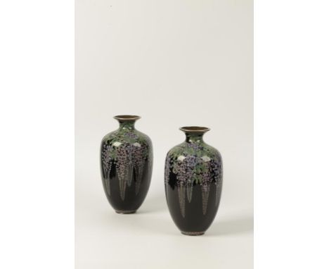 A PAIR OF JAPANESE CLOISONNE ENAMEL BALUSTER VASES with white metal neck and base rims, each worked with flowering purple wis