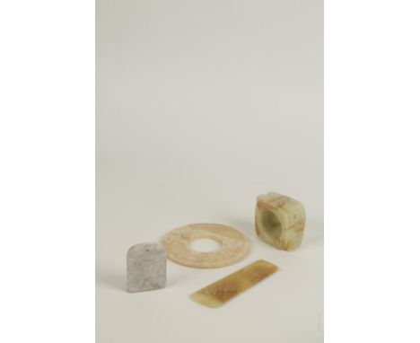 A GROUP OF FOUR CHINESE JADE ARCHAIC STYLE ORNAMENTS (4)