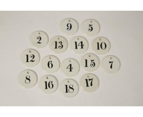 A SET OF FIFTEEN CERAMIC BIN LABELS, impressed "Farrow & Jackson, London & Paris", white glazed with black numerals (15)