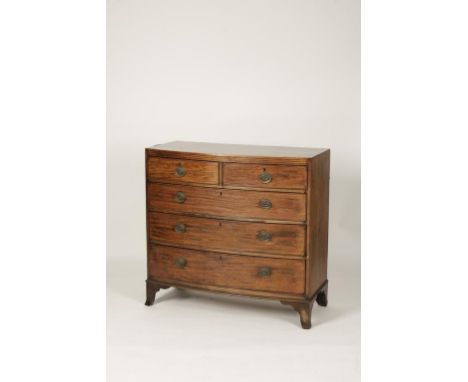 A GEORGE III MAHOGANY BOW FRONT CHEST OF DRAWERS, the shaped top with ebony stringing and caddy moulded border, above two sho