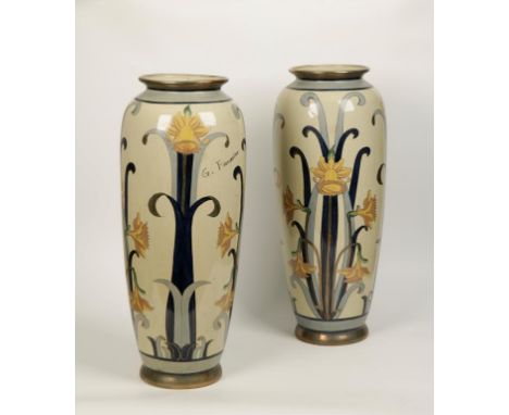 A PAIR OF LARGE ART NOUVEAU OVIFORM CERAMIC VASES with crocus decoration, on cream ground within blue borders, signed "G. Fie