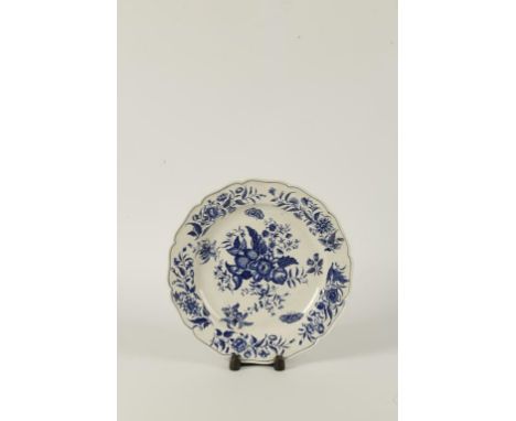 A WORCESTER BLUE AND WHITE PORCELAIN CHARGER of "pine cone" pattern, crescent mark on underside, 18th century, 12.75" dia.