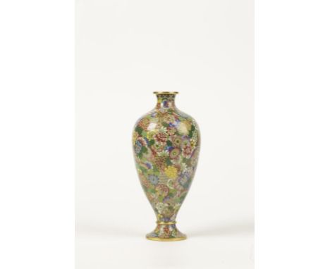 A JAPANESE CLOISONNÉ VASE with brightly enamelled floral decoration on green ground, 9.25" high