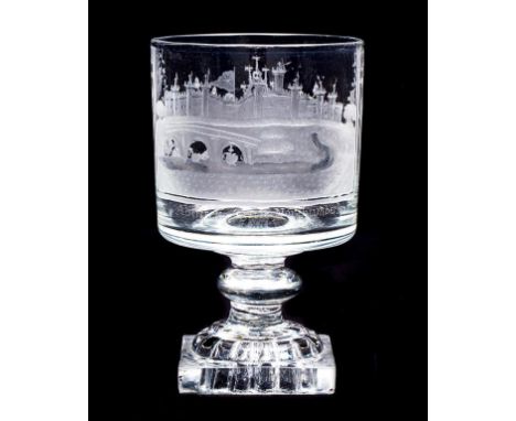 A GLASS RUMMER, the bucket bowl engraved with a view of Alnwick Castle of Northumberland with a bridge and swans in the foreg