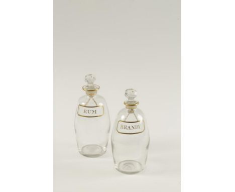 TWO DECANTERS with painted "Brandy" and "Rum" labels, early 19th century, 8" high (2)