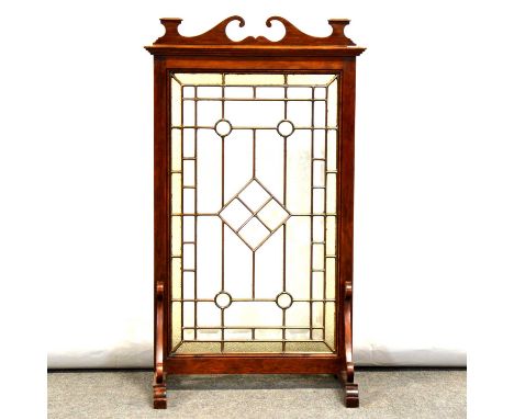 Victorian stained glass firescreen, walnut frame with swan neck top, rectangular leaded textured glass pane with geometric de