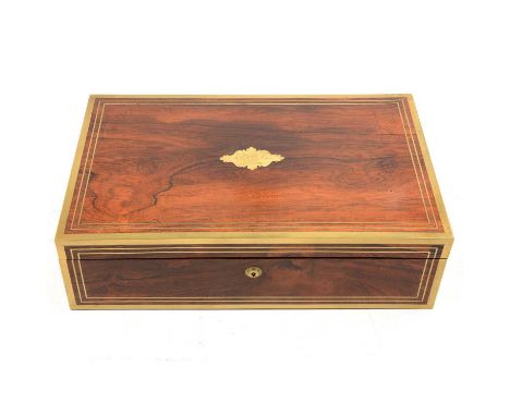 George IV rosewood and brass writing slope, fitted interior with two associated wells, brass plaque engraved and dated 1821, 