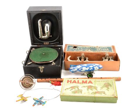 A collection of vintage toys, including Austrian Ice skates, boxed; Halma board game; and others; a vintage portable record p