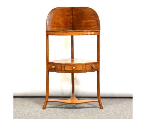 Early Victorian mahogany corner washstand, quadrant shape, raised back, basin recess, under-tier with a single drawer and dum