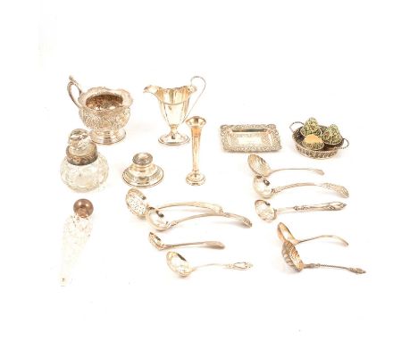 Small quantity of silver, including a pedestal cream jug, hallmarks worn, Georgian style helmet shaped cream jug, spill vase,