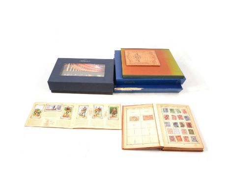 Stamps and first day covers; including a ring binder album of first day covers, schoolboy stamp album, modern commemoratives,