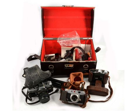 Vintage cameras and lenses, including Minolta SRT 101 35mm camera with 1:1.4 50mm lens; PEtri 35 camera with 1:2.8 4.5cm lens