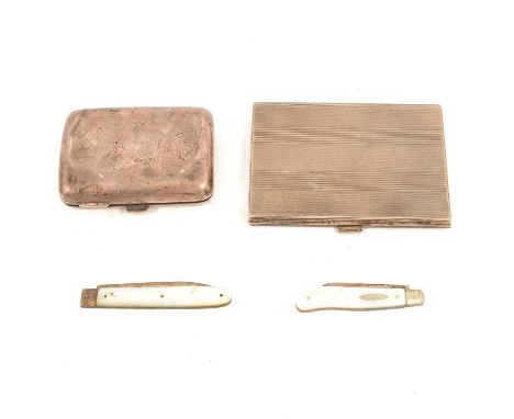 Two silver cigarette cases, one 800 standard, engine turned decoration, 11cm, 3.5oz, the other engraved, 8.5cm, 2.85oz, and t