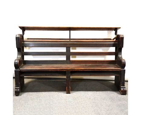 Victorian oak choir stall/ pew, with rear shelf and additional music shelf (removable), the scrolled ends carved with Gothic 