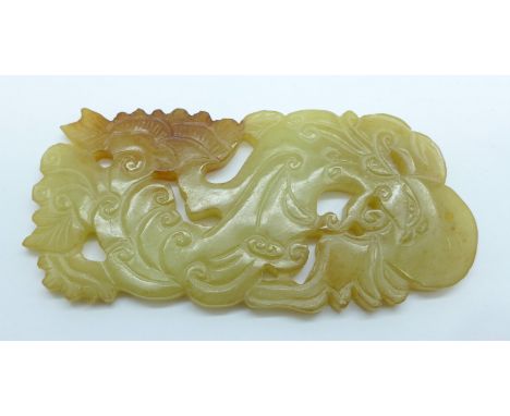 A carved jade panel, 9cm x 4cm 
