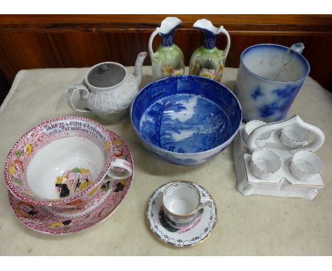 A box of 19th Century and later blue and white Willow pattern and flow blue china, a large Staffordshire motto cup and saucer