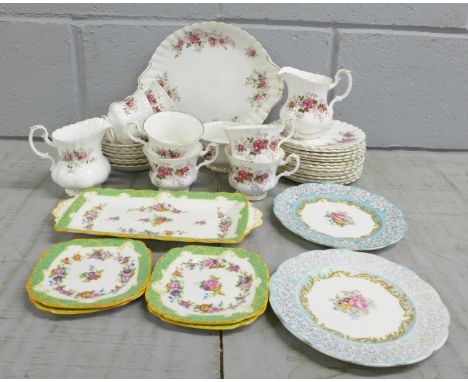 Royal Albert Lavender Rose teawares, thirty pieces; seven saucers, six cups, sugar bowl, thirteen side plates, cake plate, tw