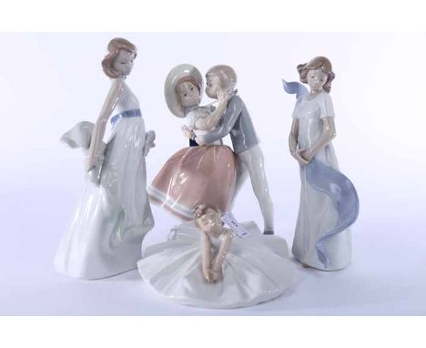 THREE LLADRO FIGURES AND SIX NAO FIGURES 
including lady with umbrella, cherub, ballerina and young lovers 