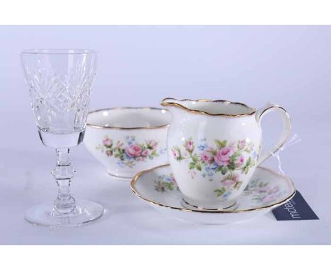 ROSLYN BONE CHINA TEA SET
including six cups and saucers, milk jug and sugar bowl, six side plates and a cake plate; together