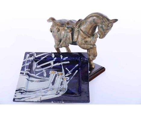 REPRODUCTION CHINESE HORSE STATUE
on a wooden stand, high; together with a decorative hand-painted ceramic plate
