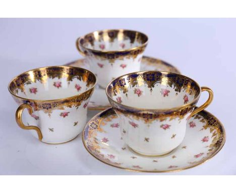 PARAGON CHINA TEA SET
with a rose pattern, blue and glod rim, marked 2359, including twelve cups, twelve saucers, twelve side