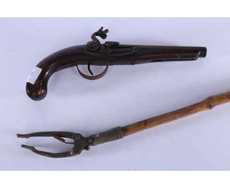 REPRODUCTION 19TH CENTURY FLINTLOCK PISTOL
with metal barrel, with working parts; together with a decorative mahogany and bra