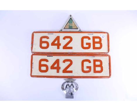 TWO VINTAGE CAR REG PLATES AND FOUR CAR BADGES