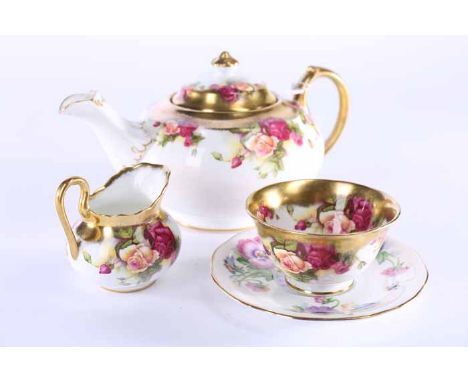 ROYAL CHELSEA GOLDEN ROSE PATTERN BONE CHINE TEA SET
including six cups, five saucers, six side plates, sugar, cream and teap