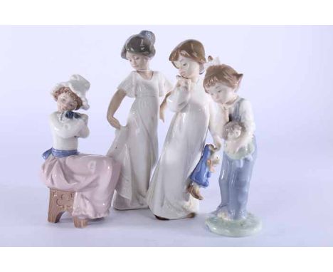 LOT OF NINE NAO FIGURES OF CHILDREN