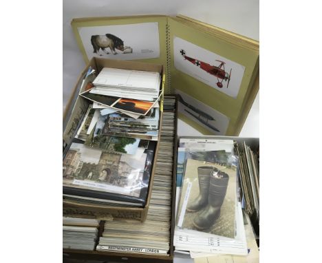 A collection of vintage postcards including topographical and humorous.