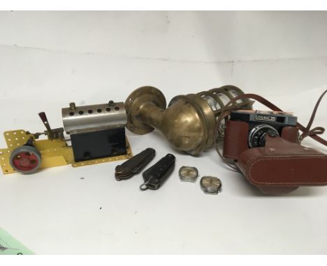 A collection of items comprising a brass cased ships wall light a cosmic35 camera two vintage folding knifes a Gents Automati
