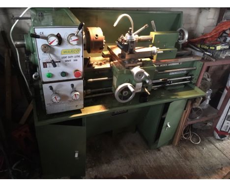 A Warco Light Duty WMT 300 Engineers Metal Turning Lathe with speed adjustment and working light. The lathe is currently in S