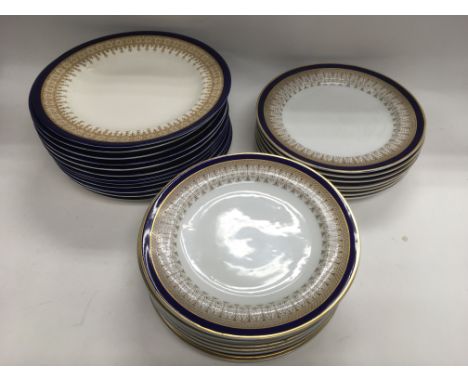 A set of Royal Worcester plates, approx sizes 26.5cm and 24cm.