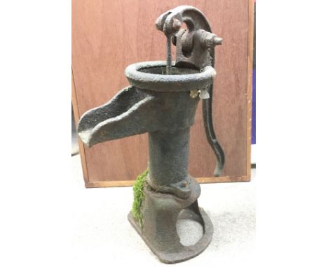 A vintage cast iron pump, approx 47cm tall.