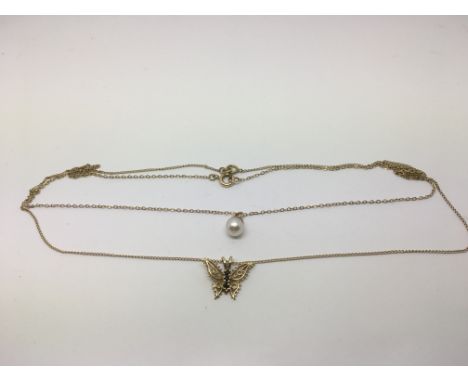 Two gold necklaces, one in the form of a butterfly, the other of a pearl (2). Approx total weight 3.4g.