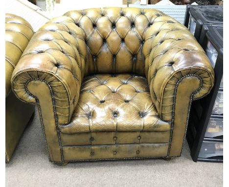 A vintage Chesterfield leather sofa with matching arm chair. Sofa measures approx 220cm long x 95cm deep x 73cm tall.