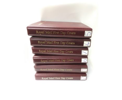 Fourteen albums of First Day Covers in Royal Mail First Day Cover albums, to include some signed examples.